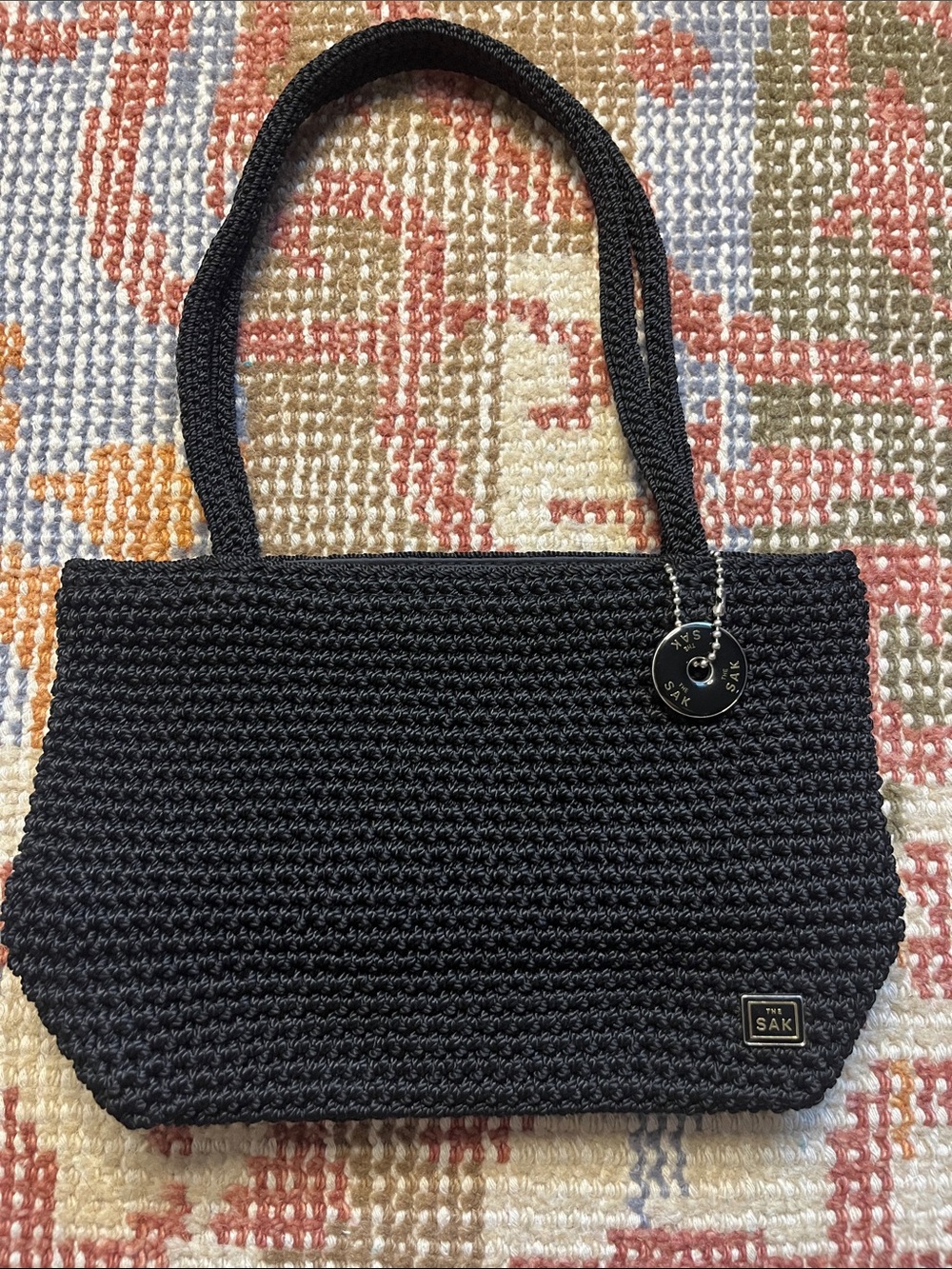 The Sak Black Crochet Knit Baguette Shoulder Mini Bag